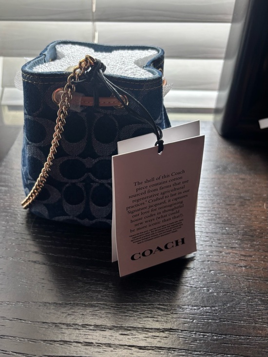 Coach Handbags - Coach Signature Denim Drawstring Wristlet
Navy Mini Bucket Bag with Gold Chain